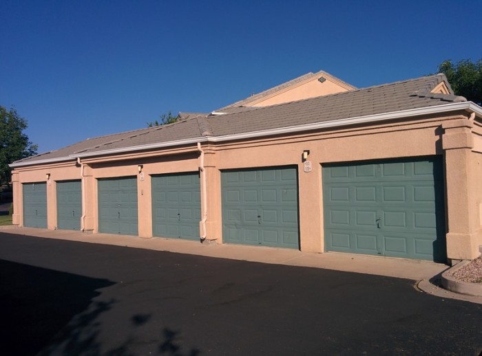 Long narrow building with 6 single car garages